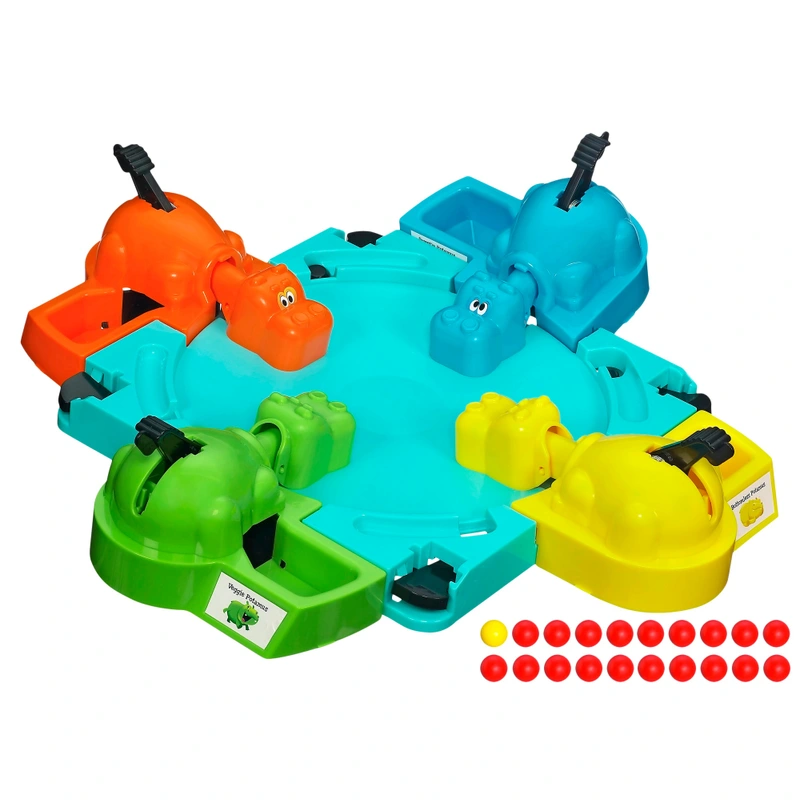 Family enjoying Hungry Hungry Hippos board game