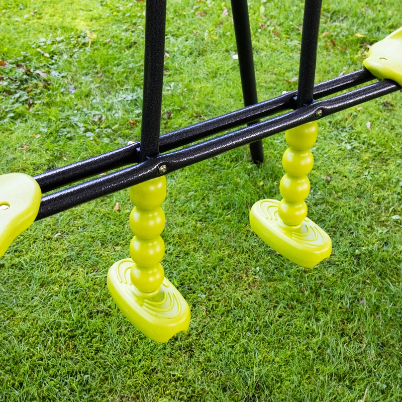 Kids having fun on garden swing set