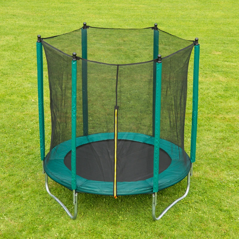 Child jumping safely on garden trampoline