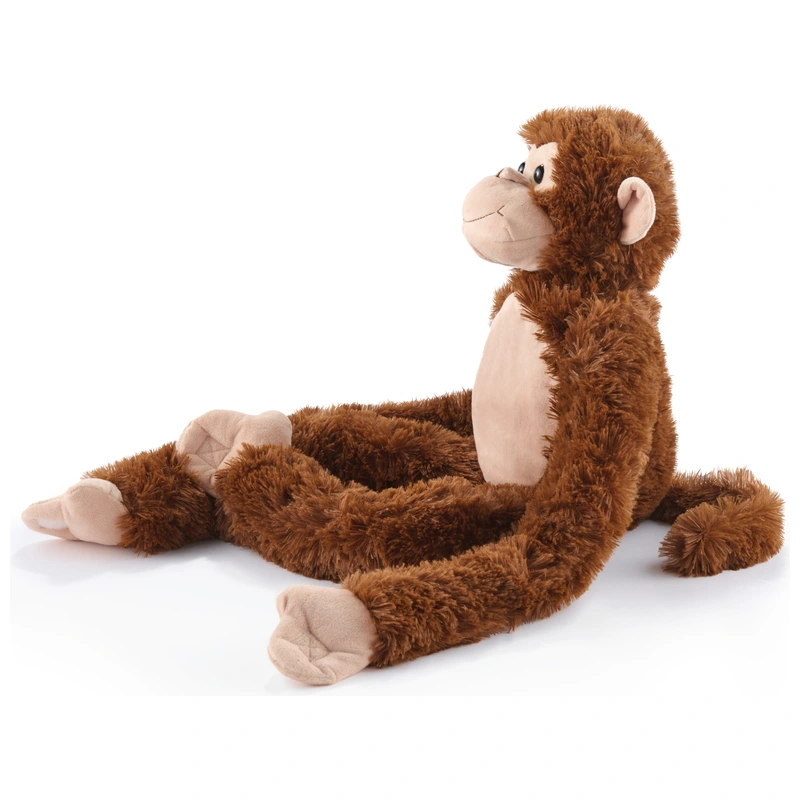 Detail of monkey soft toy fabric and face UK