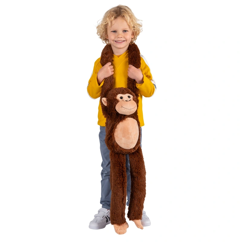 Hanging monkey toy displayed in child bedroom UK