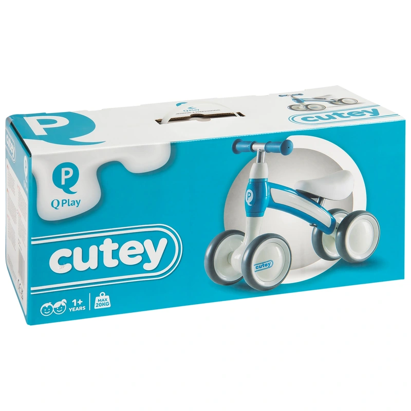 Toddler learning to ride blue balance bike UK