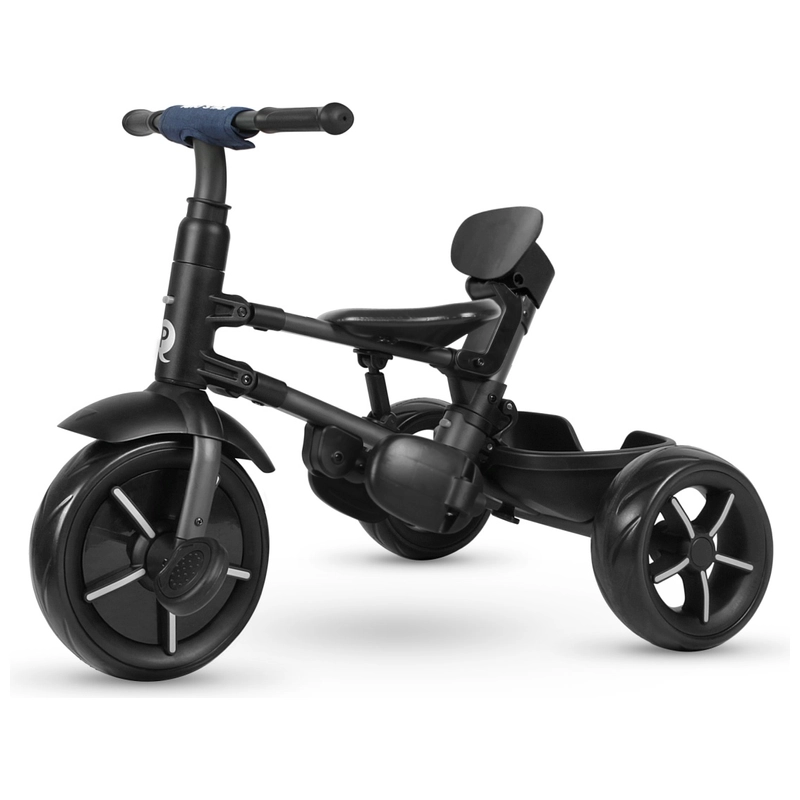 Child riding QPlay Rito Star trike outdoors