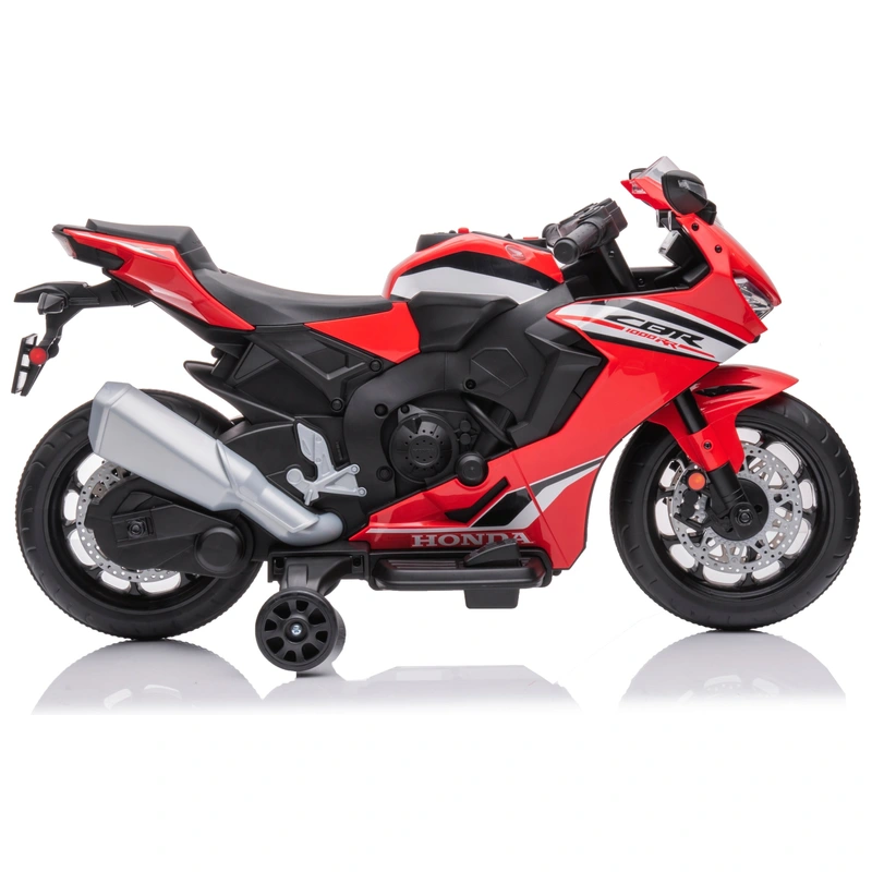Child riding Honda electric motorcycle outdoors