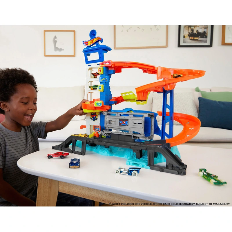 Kids playing with Hot Wheels City set UK