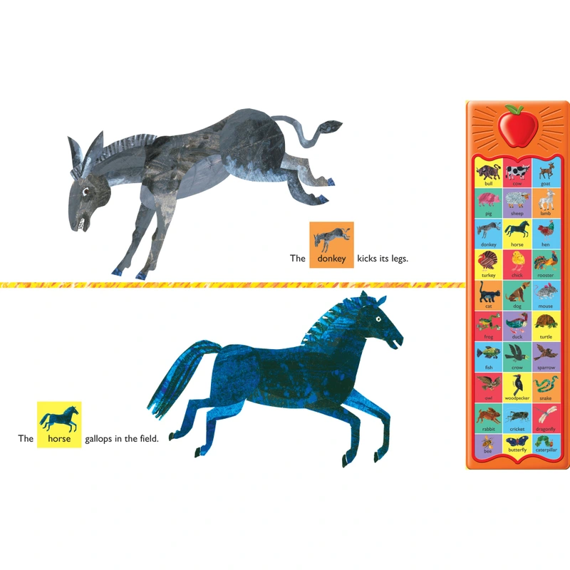 Toddler playing with Eric Carle sound book showing button detail