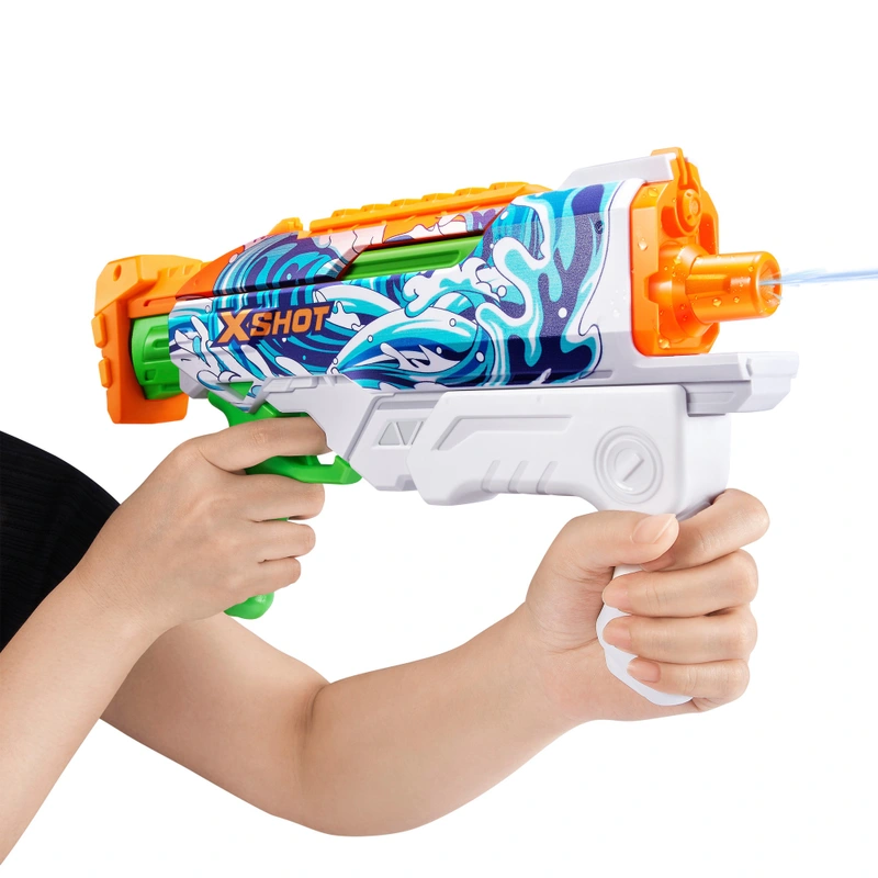 Child playing with XSHOT water toy in garden UK