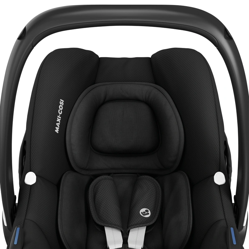 Maxi-Cosi branding on black car seat
