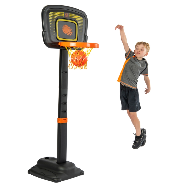 Grow’n Up Adjustable Basketball Stand in garden setting