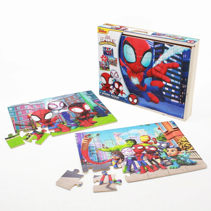 Child playing with Spidey and His Amazing Friends puzzle