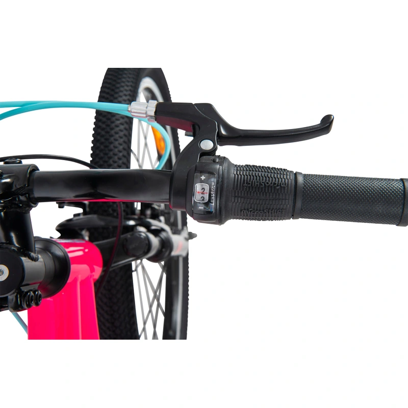 Young rider on a pink 24 inch mountain bike