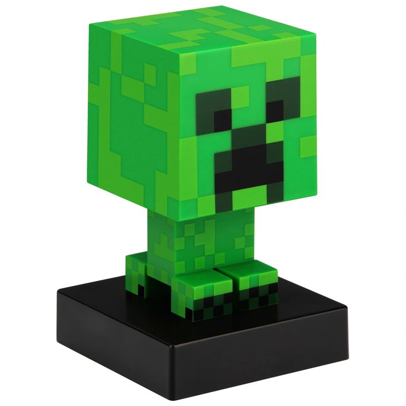 The Minecraft Creeper Icon Light displayed on a gaming shelf