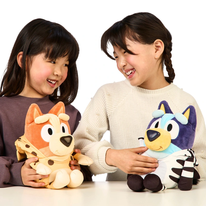 Side by side view of Bluey and Bingo interactive plush