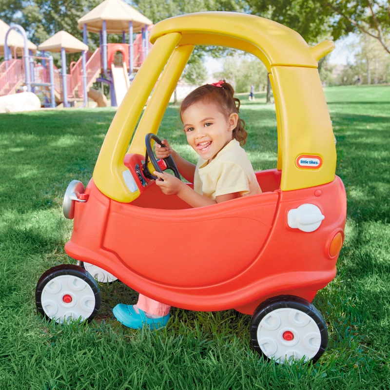 Little Tikes car with child sitting inside UK