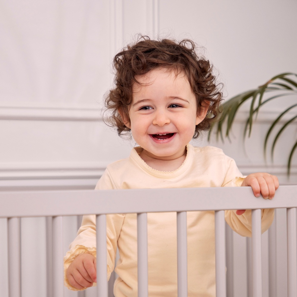 Baby Elegance OakFinish Ollie Cot with Teething Rails Smyths Toys